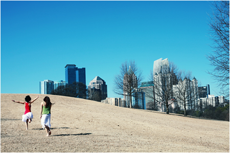 Hillside in Piedmont Park with a view of Atlanta Skyline